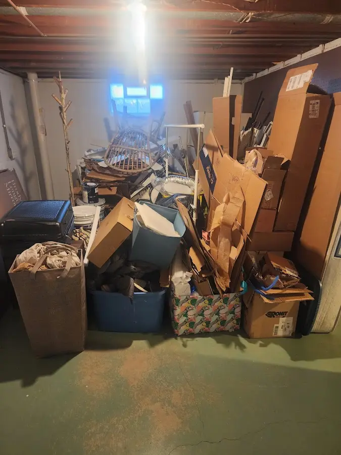 Roll-off dumpster container at job site for 15 Yard Dumpster Rental in Gladstone